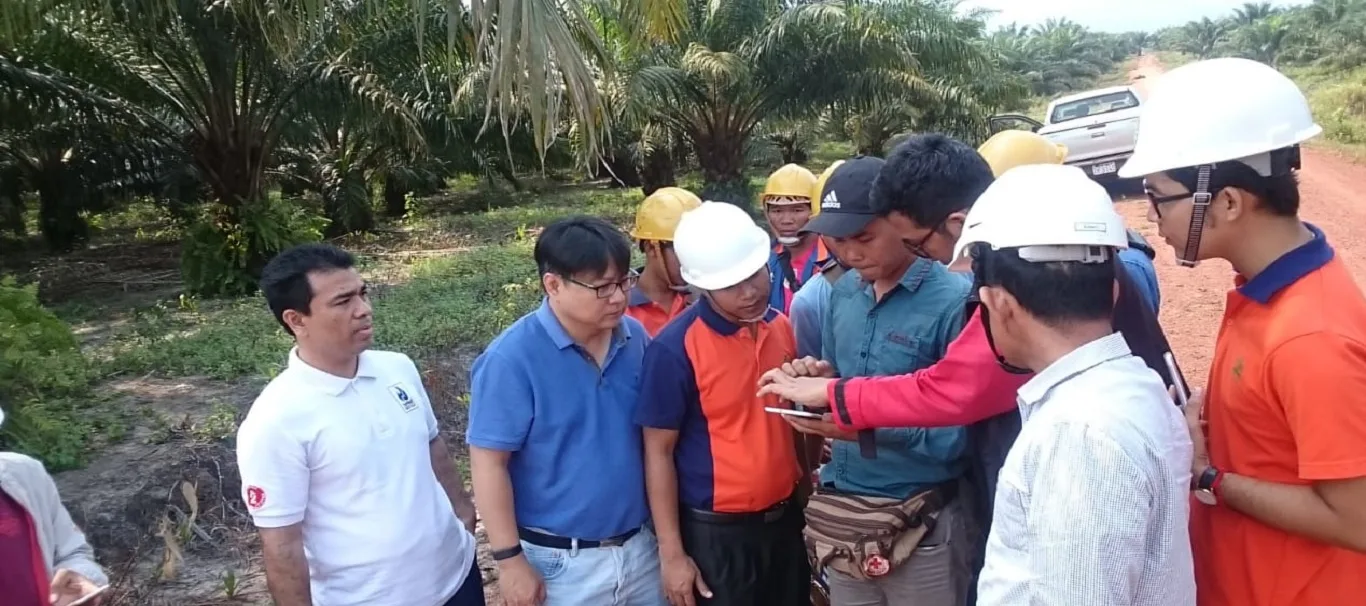 Engineers visiting a plantation estate
